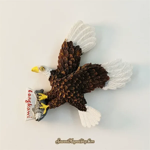 Langkawi eagle souvenir magnet side angle view showing 3D depth, white wingtips and detailed feather texture