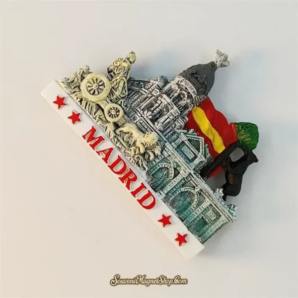Left-angled view of Madrid souvenir magnet showing 3D depth of Cibeles chariot and Spanish flag detail