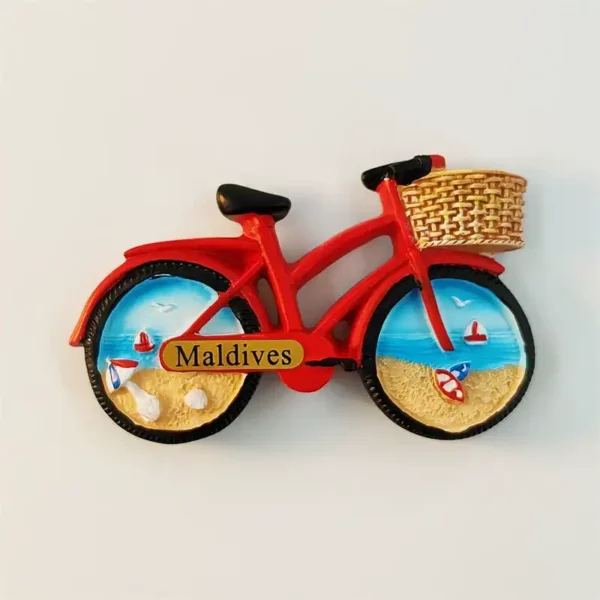 Maldives beach bicycle 3D fridge magnet front view with red cruiser bike and tropical ocean beach scenes inside both wheels