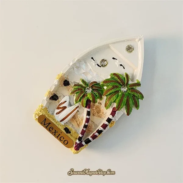 Mexico Cancun souvenir magnet left-angle view showing 3D boat shape and palm tree relief depth