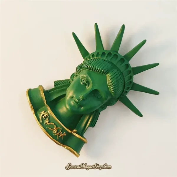 New York Statue of Liberty souvenir magnet left angle showing 3D relief depth of radiant crown rays and facial sculpture