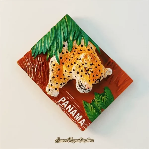 Panama jaguar souvenir magnet left angle showing 3D relief depth of prowling big cat and tropical foliage
