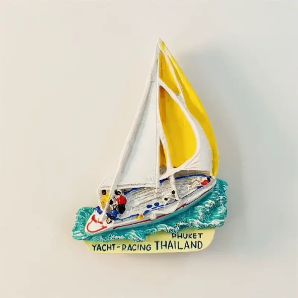 Front view of Phuket yacht racing Thailand 3D fridge magnet with white and yellow sails on turquoise waves