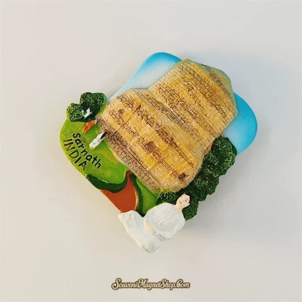 Sarnath India Buddhist souvenir magnet angled view showing 3D Dhamek Stupa and meditating Buddha figure