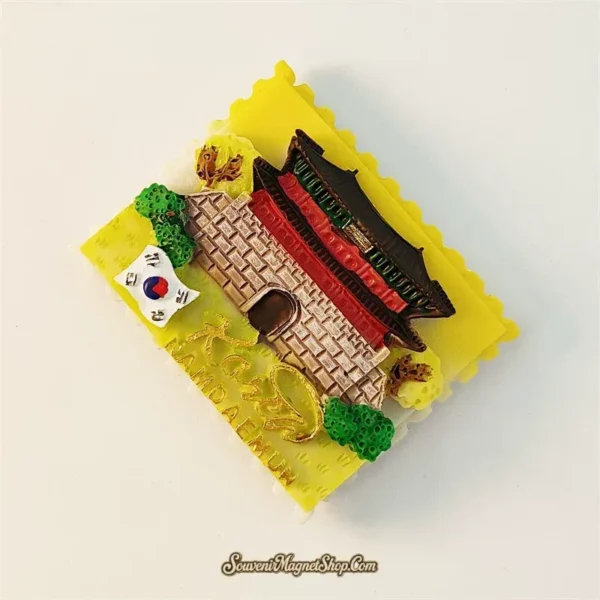 Seoul Namdaemun souvenir magnet left angle showing 3D relief depth of traditional Korean gate roof and stone archway