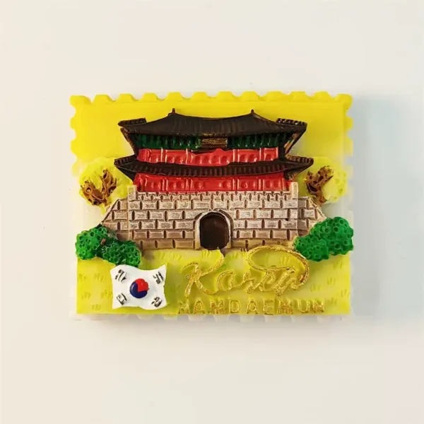 South Korea Seoul Namdaemun Gate 3D fridge magnet front view in stamp design with two-tiered roof Korean flag and gold Korea lettering on yellow background