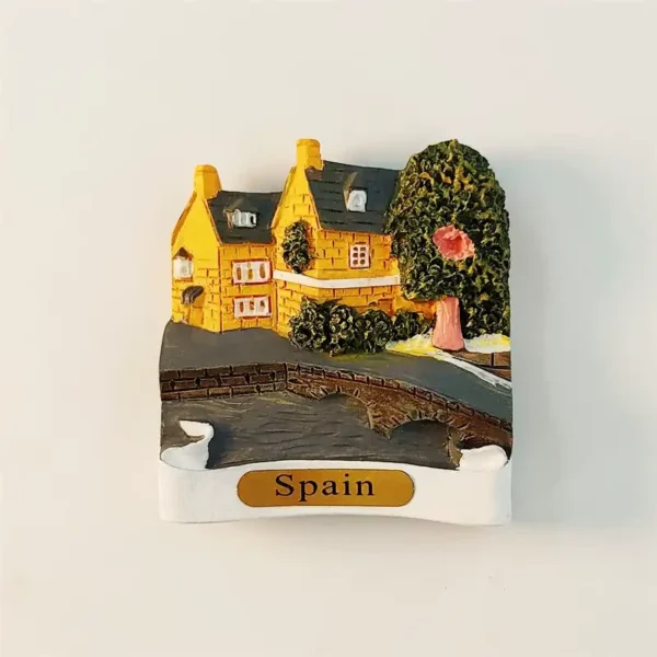 Spain village 3D fridge magnet front view with golden stone cottage arch bridge and lush green tree