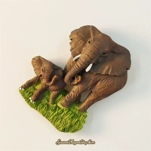 Thai elephant mother and calf souvenir magnet left angle showing 3D relief depth of wrinkled skin texture and tusks