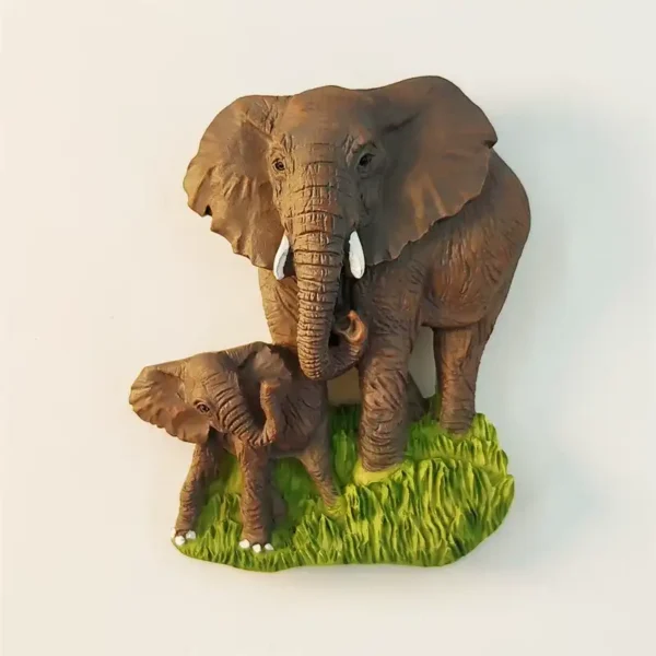 Thailand elephant mother and baby 3D fridge magnet front view with realistic brown elephants walking on green grass base with white wildflowers