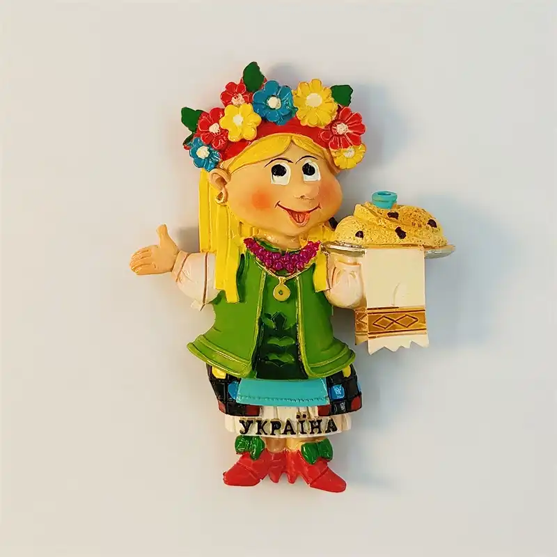 Ukraine fridge magnet front view of 3D hand-painted folk girl in flower wreath and vyshyvanka holding paska bread on rushnyk