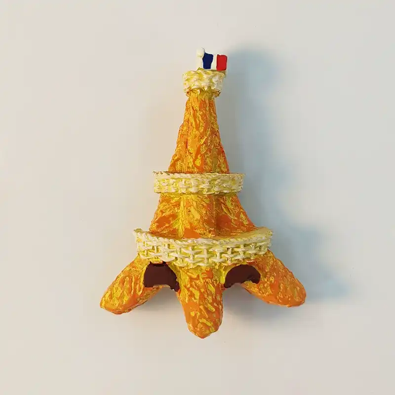 France Paris Eiffel Tower baguette fridge magnet front view with hand-painted golden crust and tricolor flag