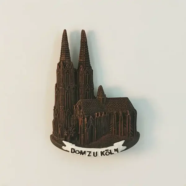 Germany Cologne Cathedral fridge magnet front view with hand-painted Gothic twin spires, bronze finish and Dom zu Koln scroll banner