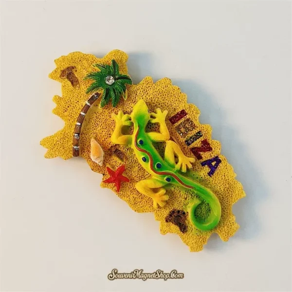 Angled Ibiza souvenir magnet showing 3D lizard sprawled across sandy island shape