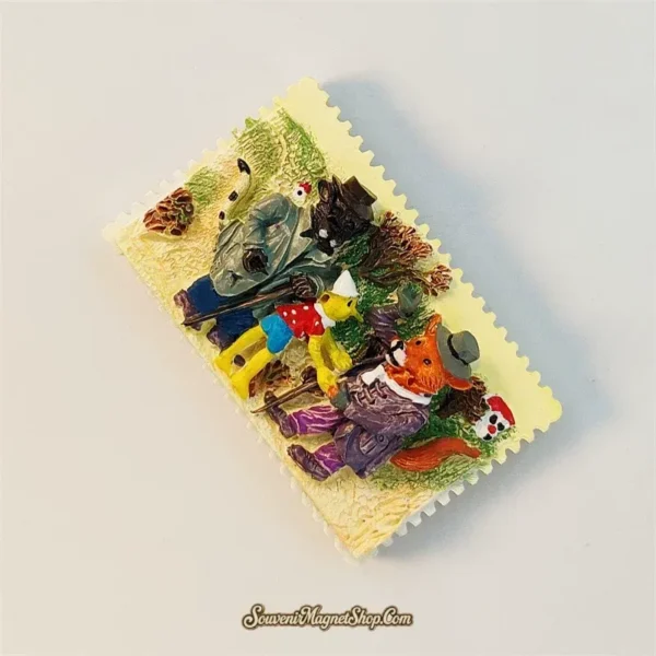 Angled Italy Pinocchio souvenir magnet showing 3D hand-painted fairytale characters, pinecones and decorative perforated border