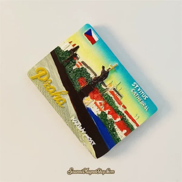 Angled Prague souvenir magnet showing 3D hand-painted Karluv Most, St. Vitus Cathedral and gold Praha lettering