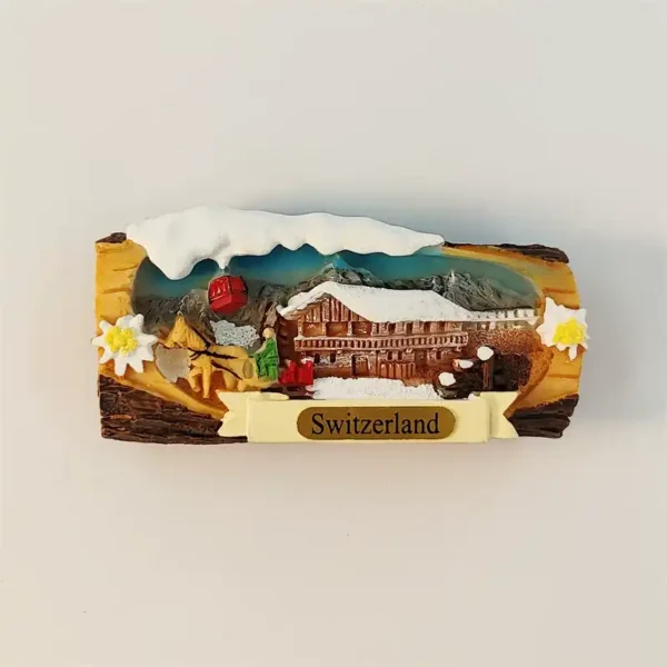 Front view of Switzerland Jungfrau fridge magnet with 3D snow-capped peak, brown alpine chalet, red cable car and edelweiss on a log-shaped resin base