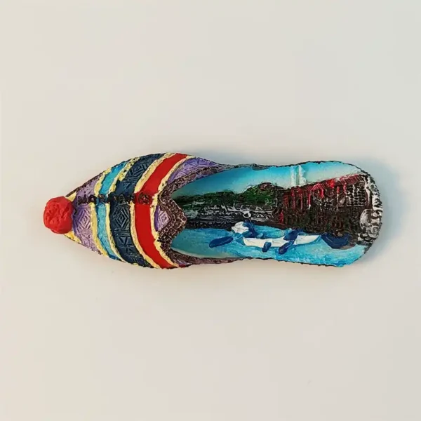 Front view of Marmaris Turkish slipper fridge magnet with painted Aegean harbor scene inside
