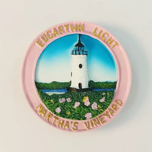 USA Martha's Vineyard Edgartown Lighthouse fridge magnet front view with hand-painted white tower, grassy meadow, pink rugosa roses and pink round frame
