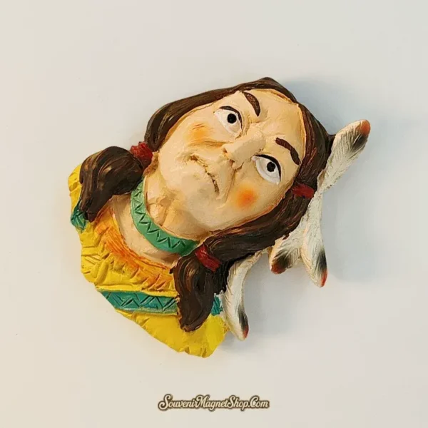 Angled view of USA Native American souvenir magnet revealing 3D depth of facial features, braids and white feather headpiece