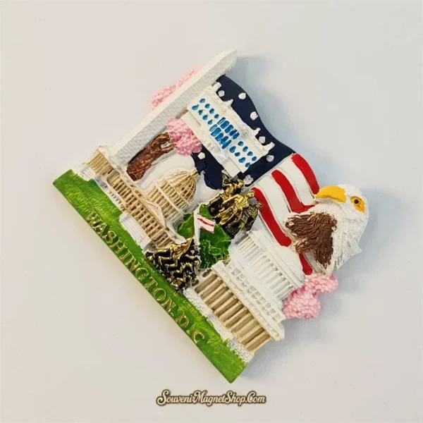 Angle view of Washington DC souvenir fridge magnet showing 3D White House facade Iwo Jima Memorial and American flag detail