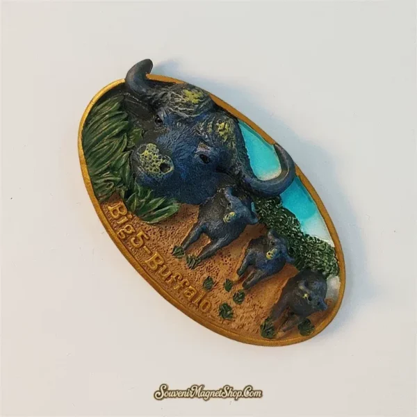 Angled view of Africa Big Five buffalo souvenir magnet showing 3D buffalo and calves in savanna scene