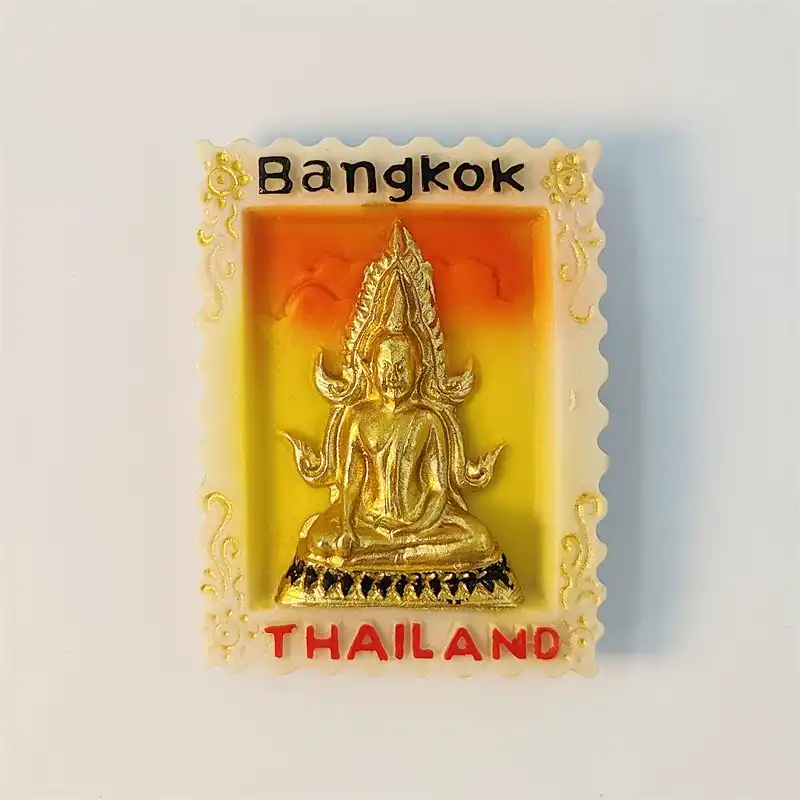 Bangkok Thailand fridge magnet shaped like a stamp with golden seated Buddha, front view