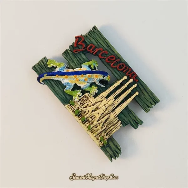 Angled Barcelona souvenir magnet showing 3D Sagrada Família spires and colourful Gaudí lizard