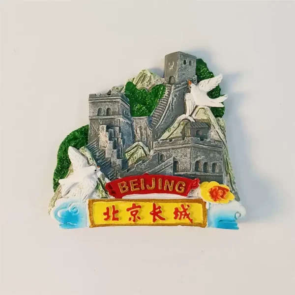 Front view of Beijing Great Wall fridge magnet with stone watchtowers, white doves and BEIJING banner