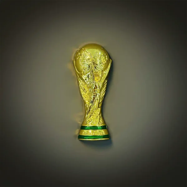FIFA World Cup Trophy fridge magnet front view, 3D gold metal souvenir with green enamel base