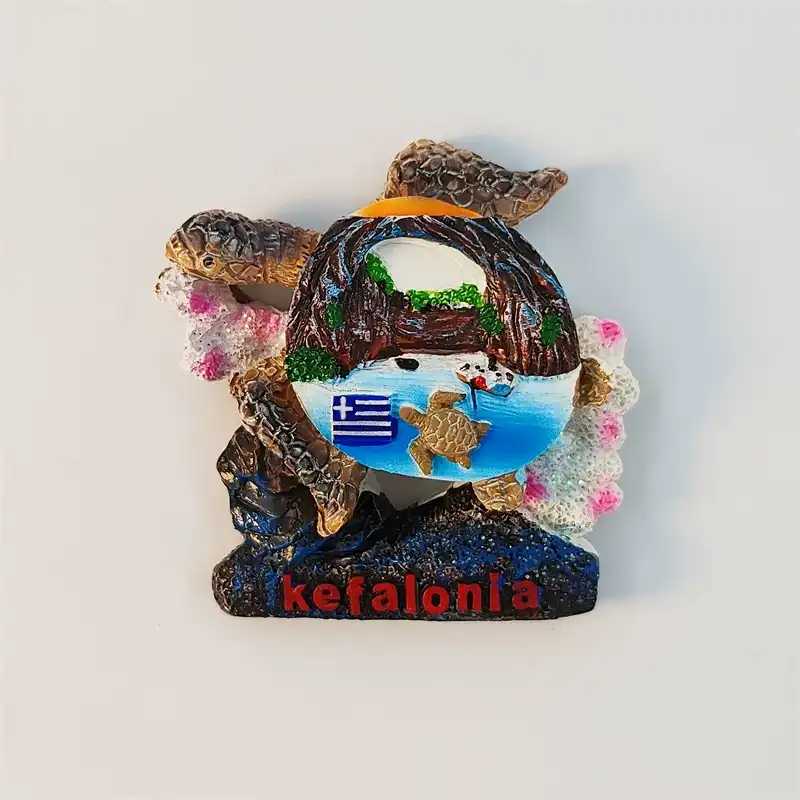 greece-kefalonia-sea-turtle-fridge-magnet-front Front view of Greece Kefalonia sea turtle fridge magnet with island beach scene and Greek flag