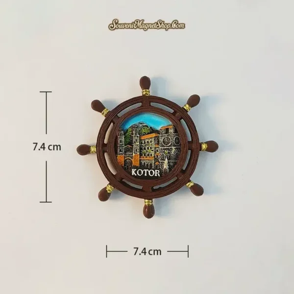 Kotor ship's wheel fridge magnet size reference showing 7.4 cm by 7.4 cm dimensions