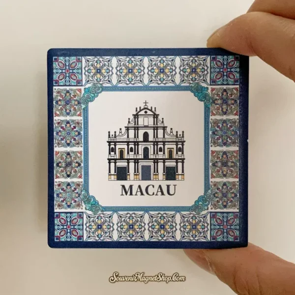 Macau azulejo ceramic tile souvenir magnet held in hand showing St. Paul's facade and tile patterns