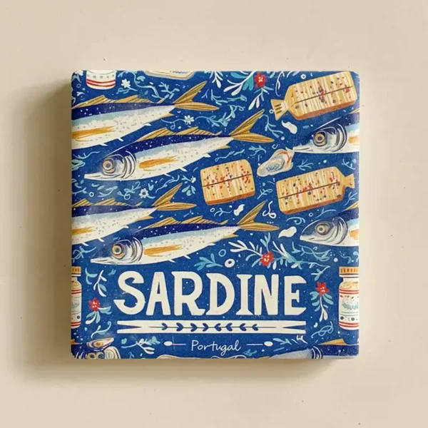 Portugal sardine fridge magnet front view, blue ceramic tile with hand-painted sardines and SARDINE Portugal text