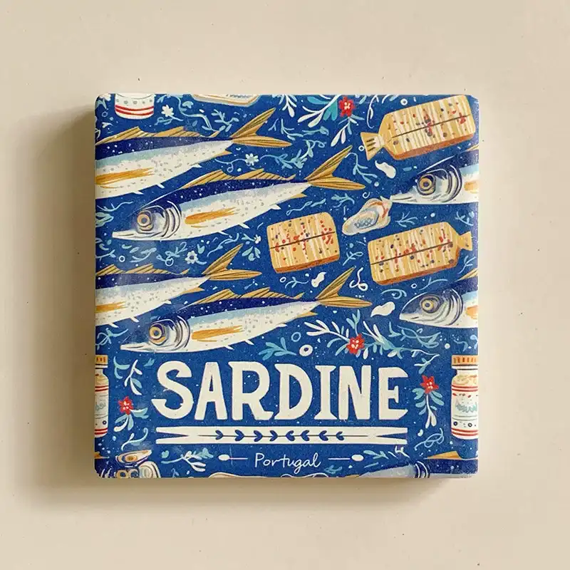 portugal-sardine-fridge-magnet-front Portugal sardine fridge magnet front view, blue ceramic tile with hand-painted sardines and SARDINE Portugal text