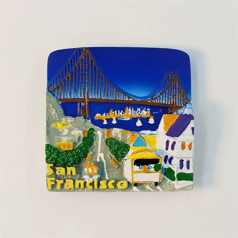 USA San Francisco fridge magnet with Golden Gate Bridge, cable car and Victorian houses front view