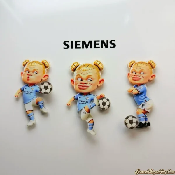 Three double-bun Haaland caricature magnets in Man City kits on a white Siemens fridge, each with a soccer ball
