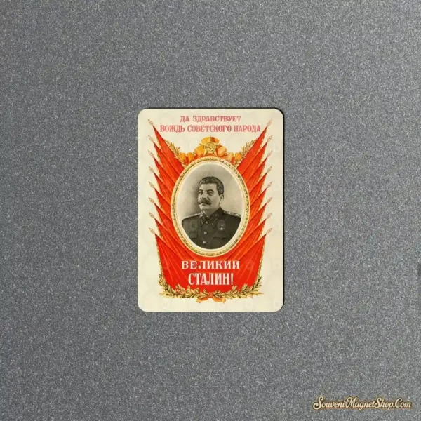 Vintage Soviet fridge magnet with a Stalin portrait framed by red banners, gold laurel, and Cyrillic text