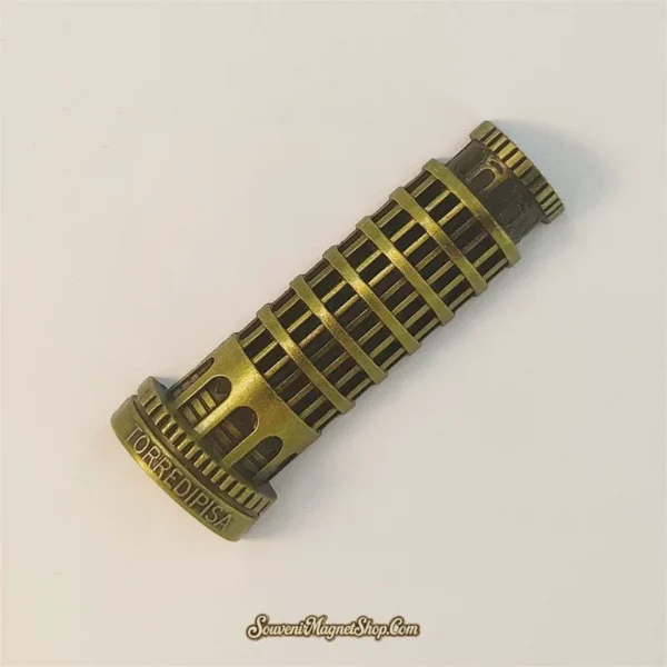 Angled view of a freestanding 3D metal Leaning Tower of Pisa souvenir magnet in antique bronze