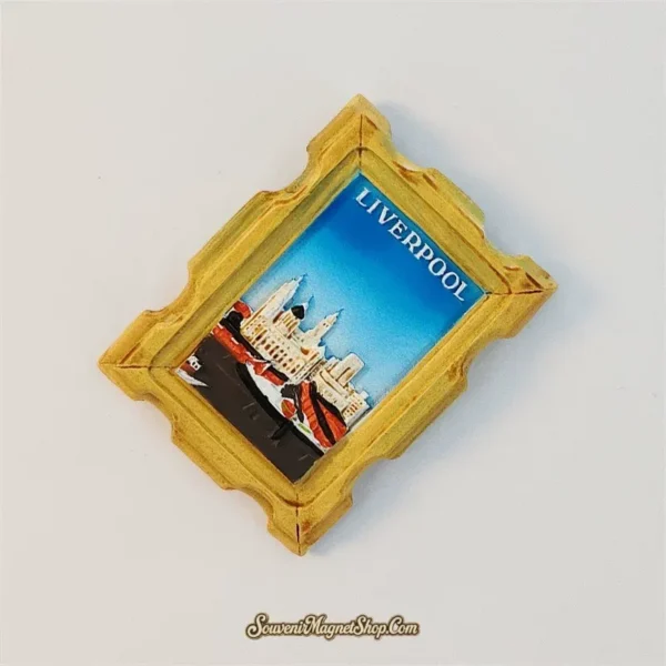 Angled view of framed Liverpool souvenir magnet showing gold resin frame and skyline