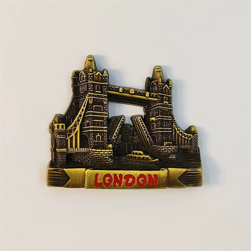london-tower-bridge-fridge-magnet-front Front view of a golden 3D London Tower Bridge fridge magnet with red LONDON banner