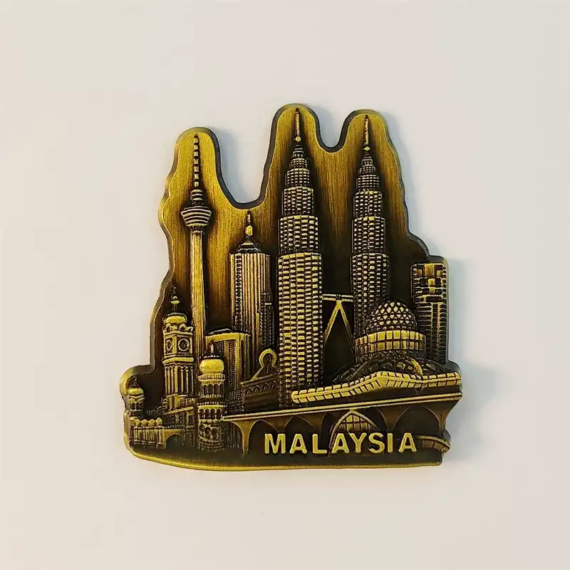 malaysia-kuala-lumpur-skyline-fridge-magnet-front Front view of Malaysia fridge magnet showing Kuala Lumpur skyline with Petronas Towers, KL Tower and mosque in antique-gold 3D metal relief