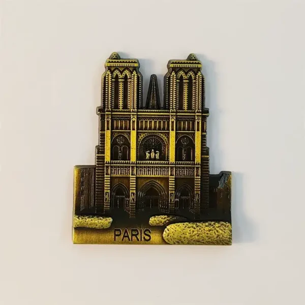 Front view of antique gold Paris Notre-Dame Cathedral fridge magnet with twin towers and rose window