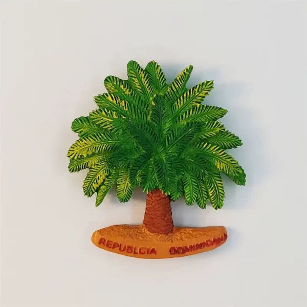 Front view of a 3D Dominican Republic palm tree fridge magnet with green fronds and an orange sandy base reading Republica Dominicana