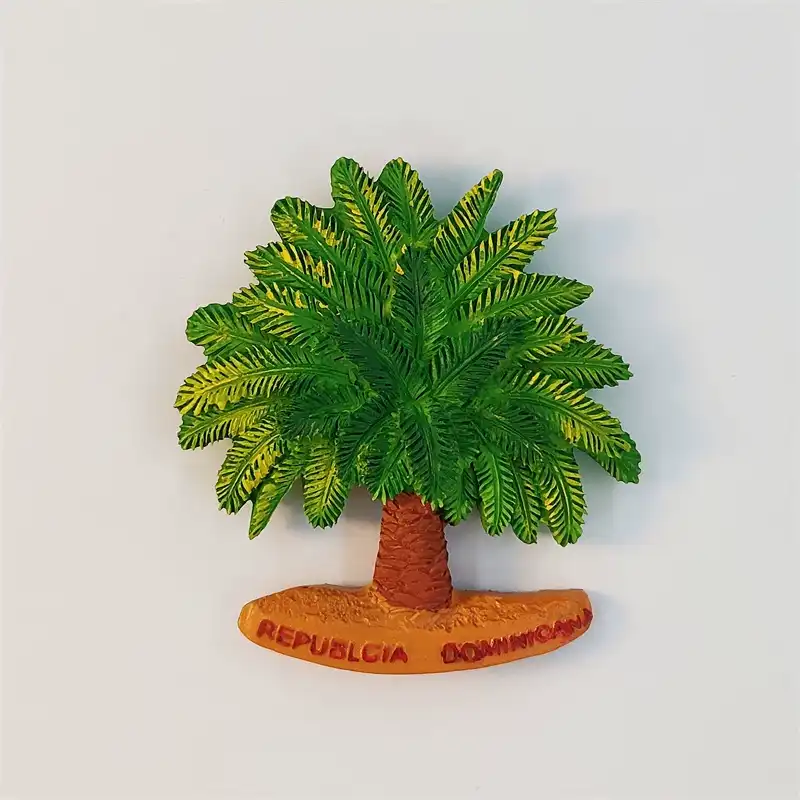 punta-cana-palm-tree-fridge-magnet-front Front view of a 3D Dominican Republic palm tree fridge magnet with green fronds and an orange sandy base reading Republica Dominicana