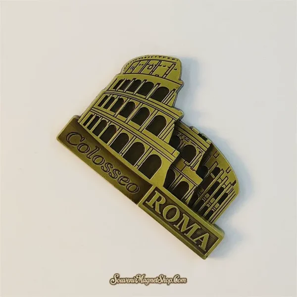 Angled view of bronze Rome Colosseum souvenir magnet showing tiered arches in relief
