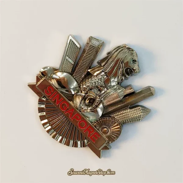 Angled view of chrome Singapore skyline magnet showing Merlion and city towers