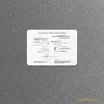 White fridge magnet showing the Voyager Golden Record cover diagram with pulsar map and binary code