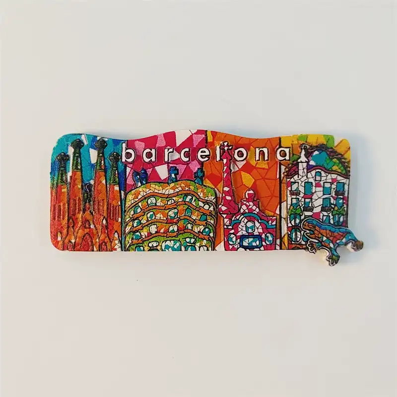 Hand-painted Barcelona fridge magnet with Gaudi mosaic landmarks and barcelona lettering, front view