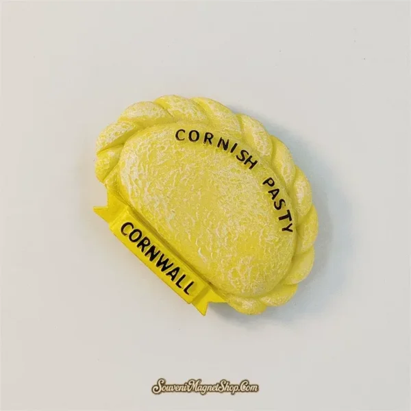 Angled view of hand-painted Cornish pasty souvenir magnet from Cornwall UK