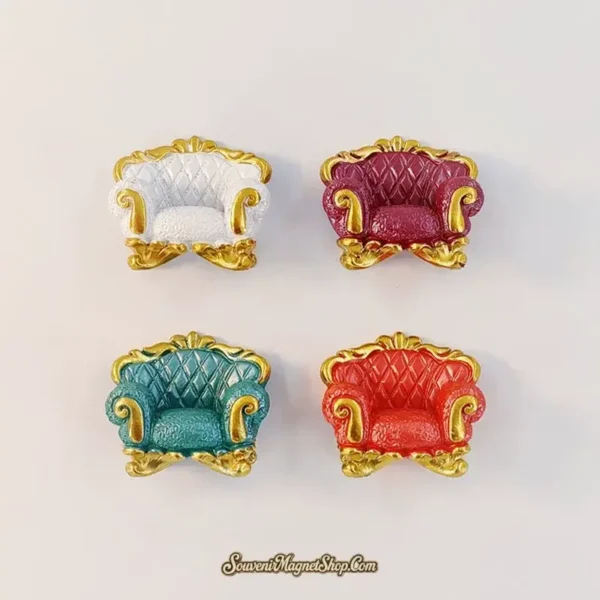 Four gold-trimmed baroque armchair fridge magnets in white, burgundy, teal and red